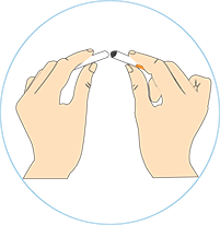 image of hands breaking a cigarette 