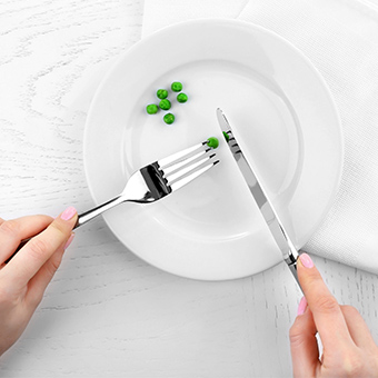 a plate with green peas