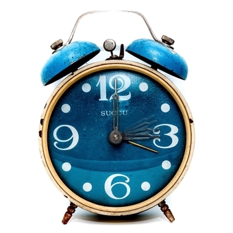 a picture of a blue alarm clock 