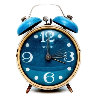 a picture of a blue alarm clock